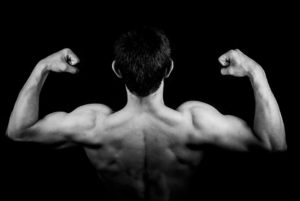 Muscular man shoulder muscles