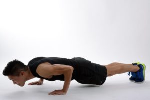 Man performing push up EBOOST At-home Workout