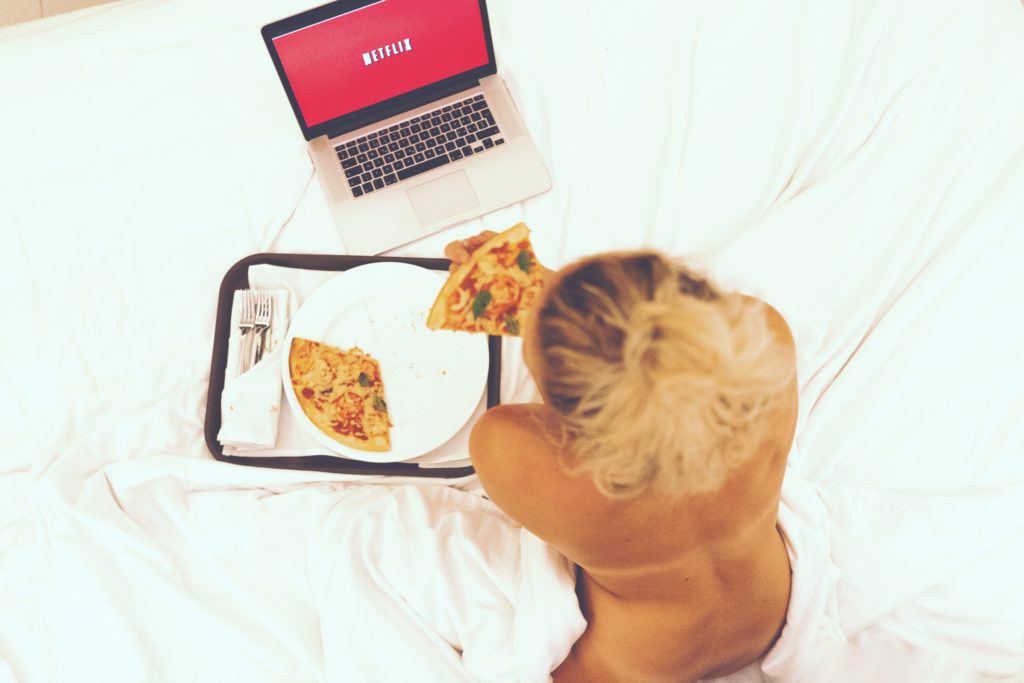 pizza and netflix in bed