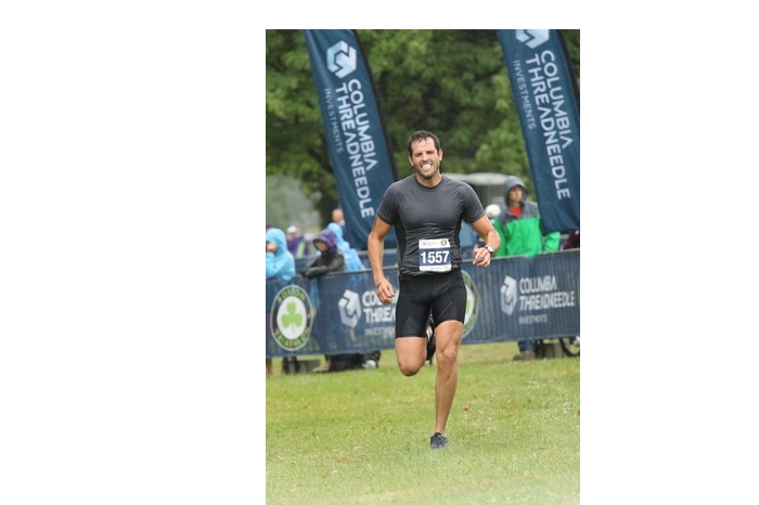 EBOOST Ambassador Sam Poryanda running in a race