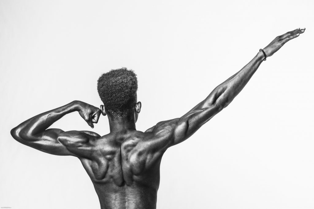 man with muscular shoulder and back